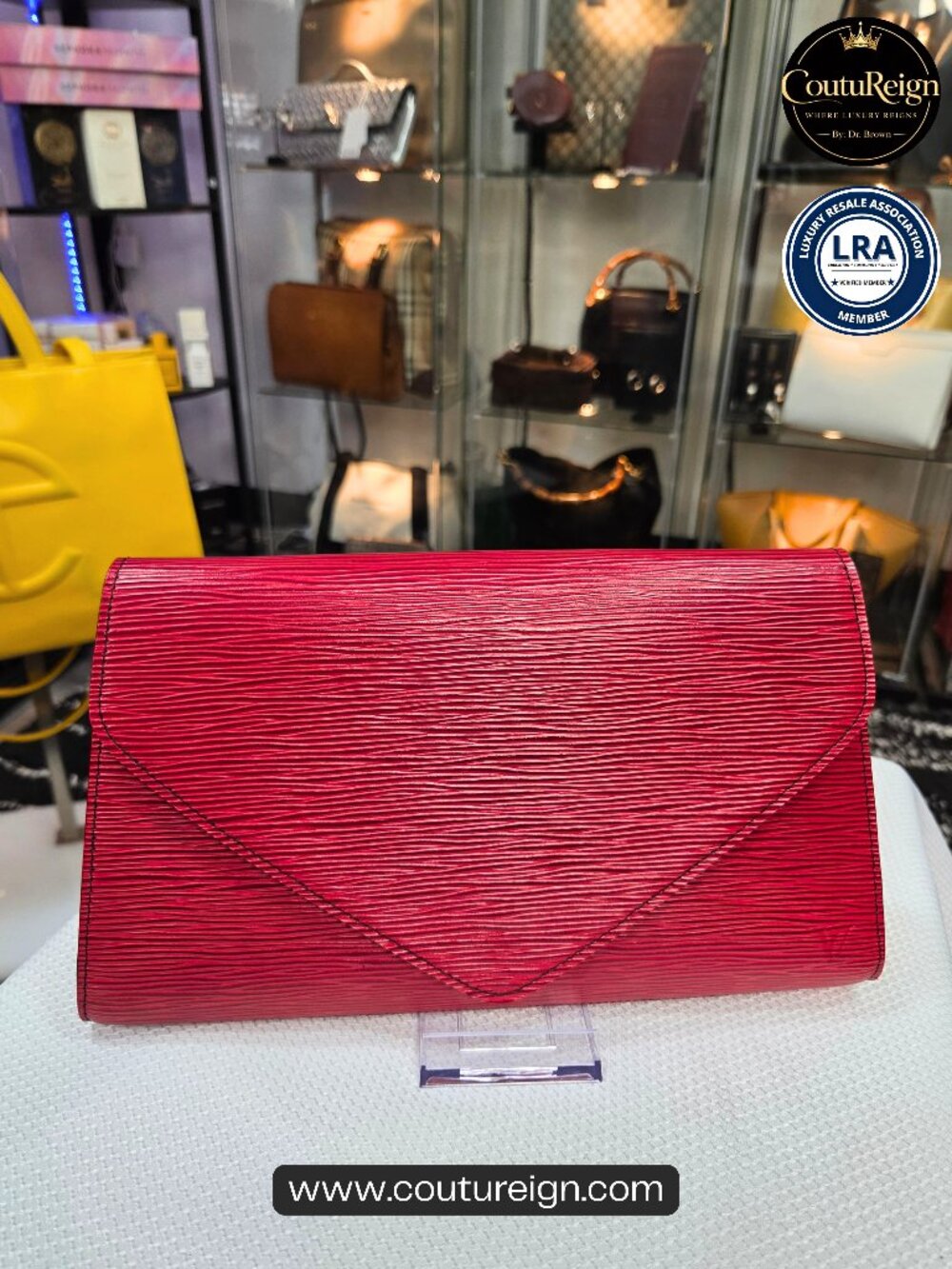 Louis Vuitton - Leather clutch,  Pochette Arts Deco Epi Red